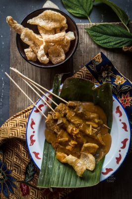  Sate Padang! Smażony aromat w połączeniu z intensywną pikantnością tworzą niezapomnianą symfonię smaków.